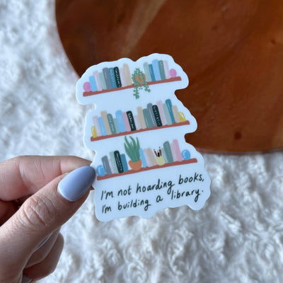 "I'm not hoarding books, I'm building a library" Sticker